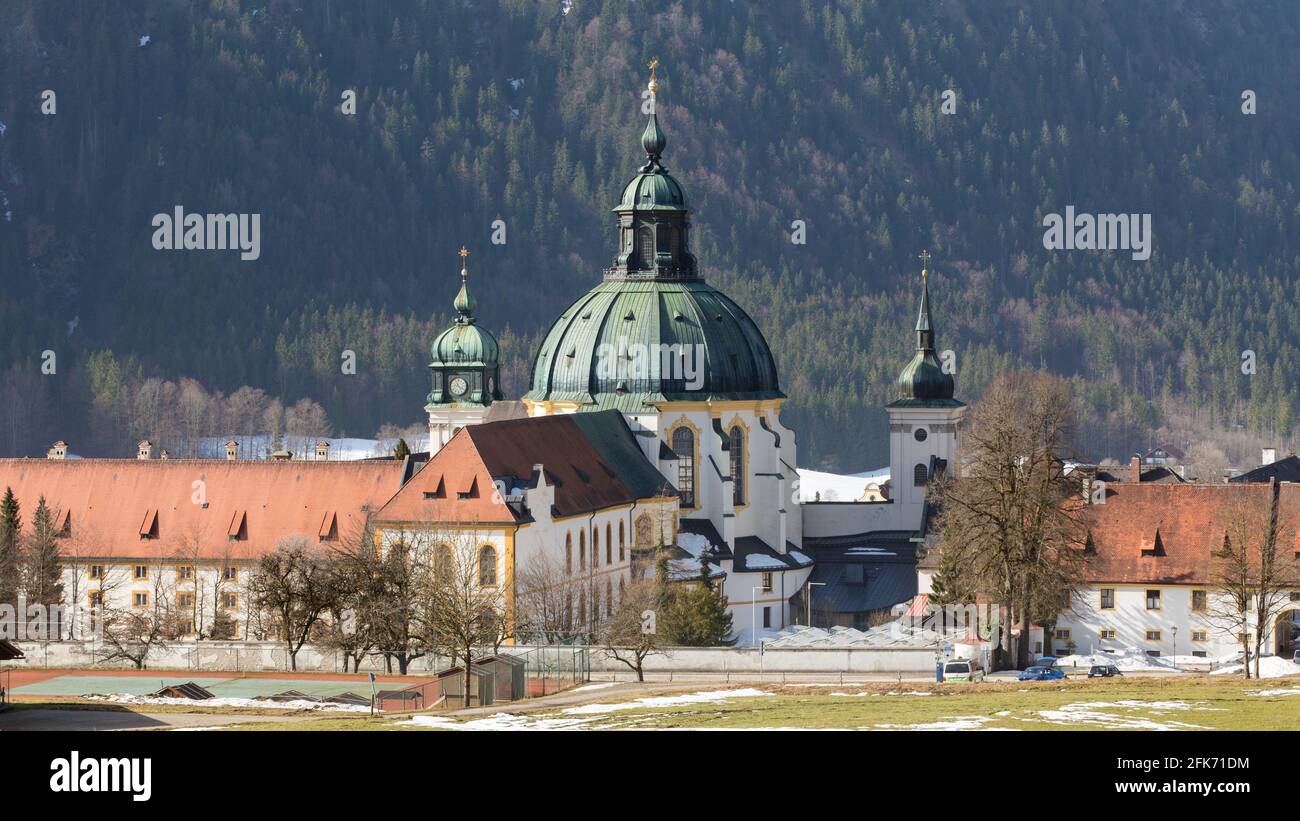 Ettal, Germany - Feb 26, 2021: View on the church of Ettal Abbey (Kloster Ettal). Panorama format. Stock Photo