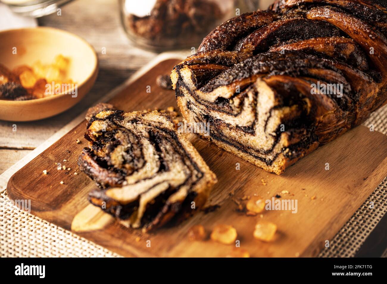 Chocolate babka or brioche bread. Stuffed with chocolate and hazelnut cream. Stock Photo