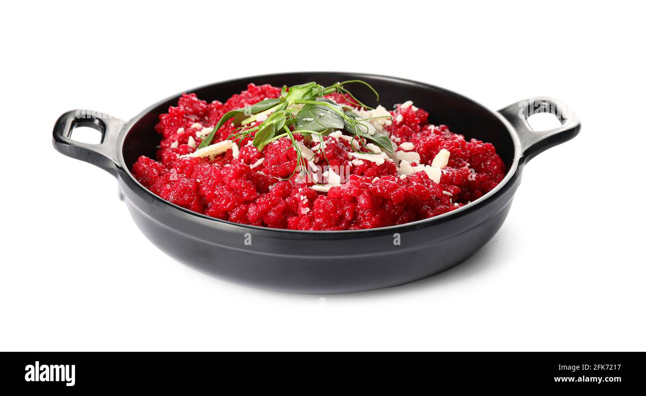 Frying pan with tasty beet risotto on white background Stock Photo Alamy