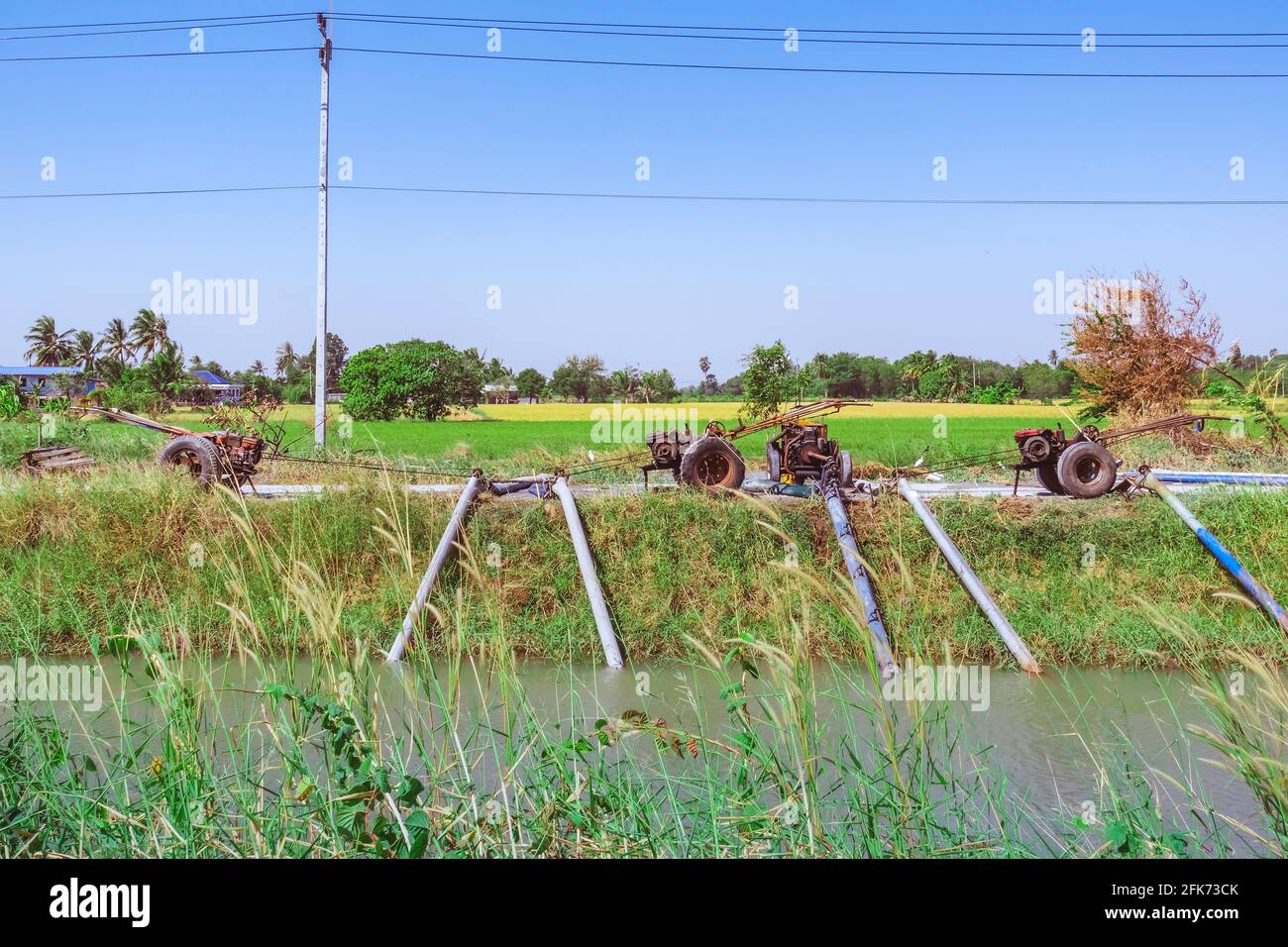 Row of water pump on trailer used to pump water from irrigation canal