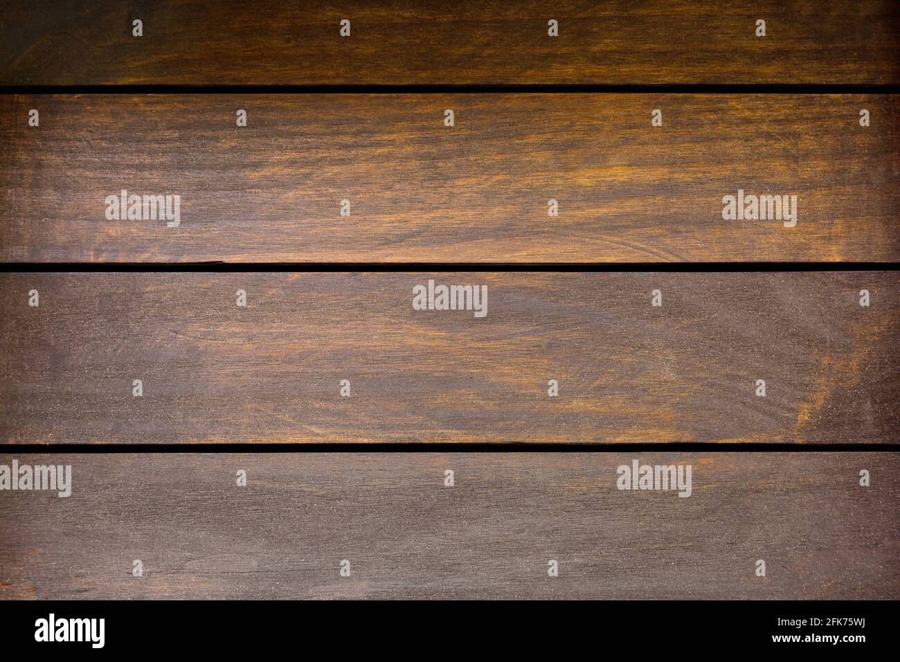 Texture of stained brown wooden background, old rustic wood planks on black background Stock Photo