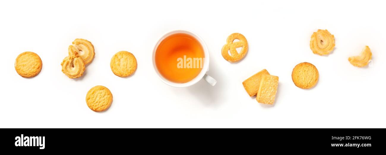 Danish butter cookies and tea panorama, overhead flat lay shot on a white background Stock Photo