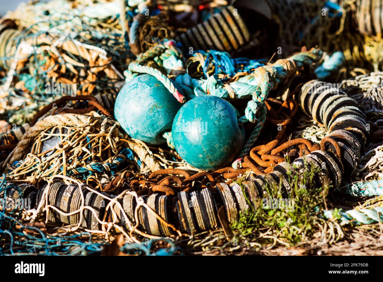 Items of fishing gear for catching fish lying on the shore Stock Photo -  Alamy