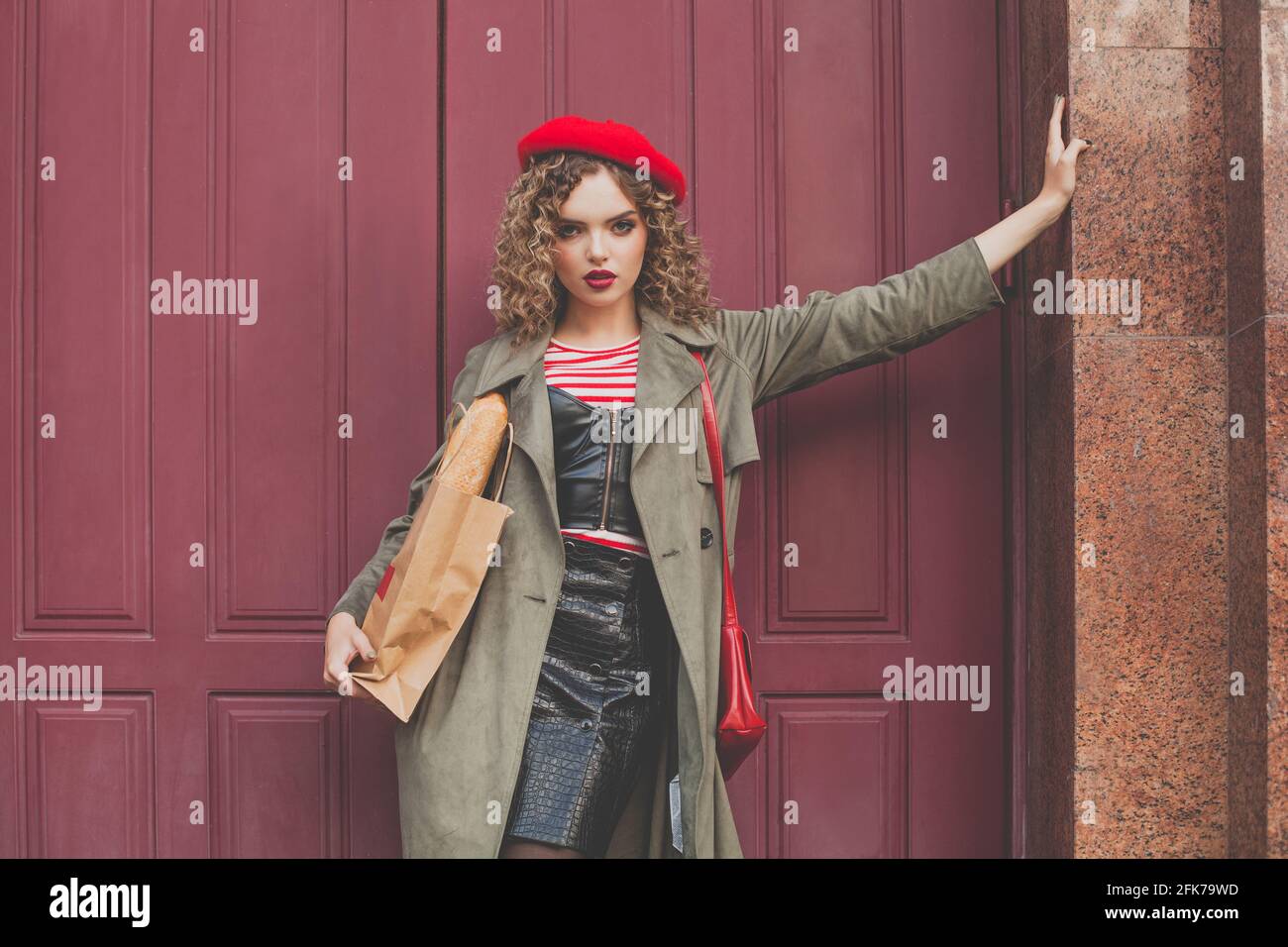 Fashion model woman in red beret 