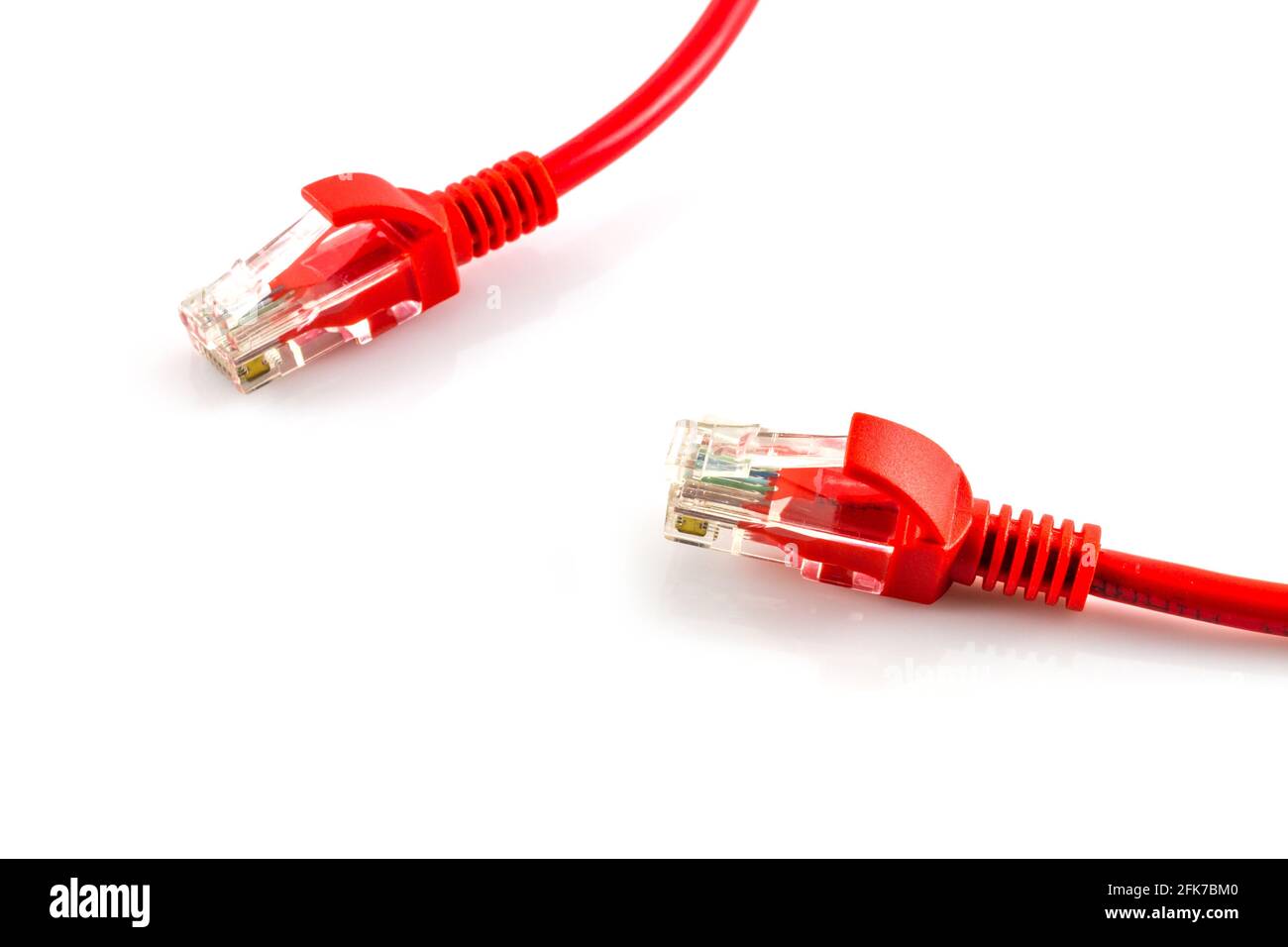 Connections of red network cable red lan cable background Stock Photo