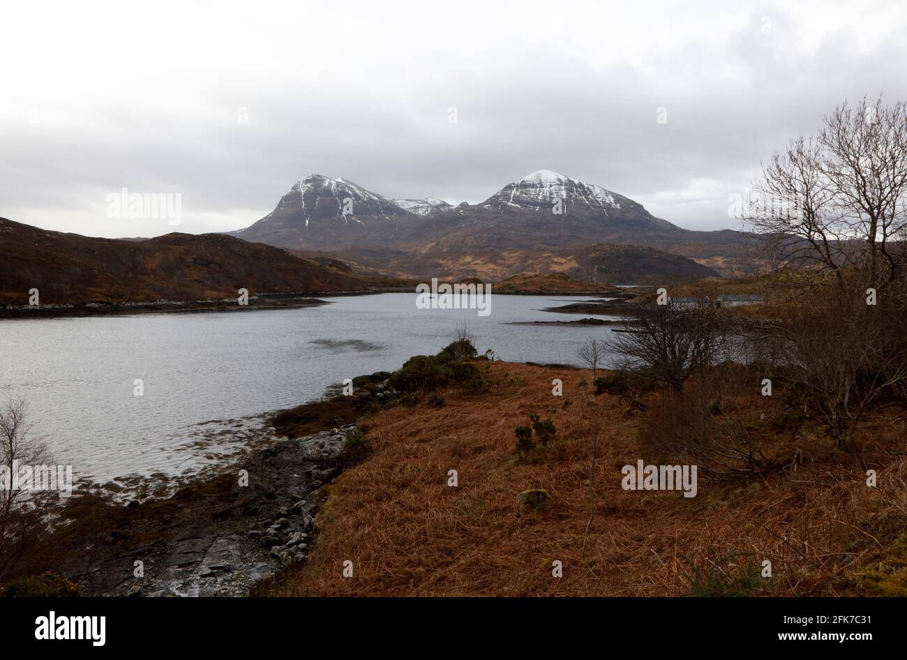 View across Loch Glendhu to the mountain of Quinag, Sutherland, Scotland, UK Stock Photo