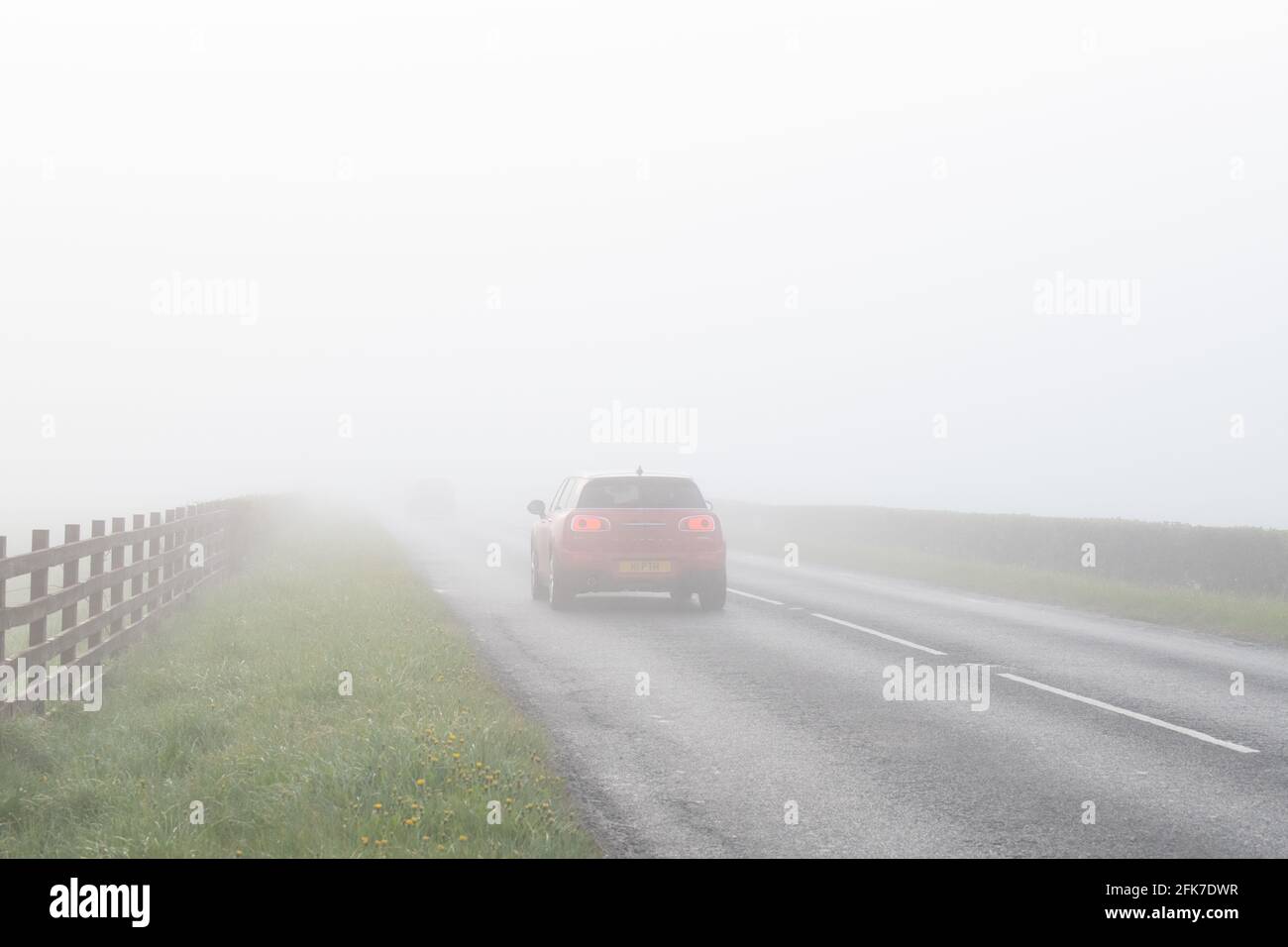 Kippen, Stirling, Scotland, UK. 29th Apr, 2021. UK weather - very misty start for drivers on the A811 road near Kippen Credit: Kay Roxby/Alamy Live News Stock Photo