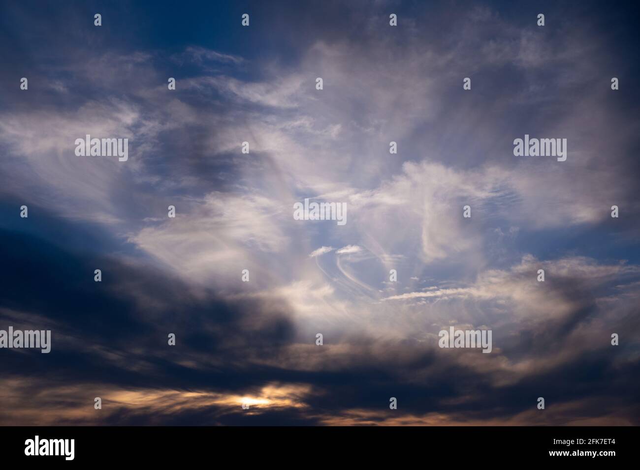 Beautiful colorful sunset sky with clouds and sunlight Stock Photo - Alamy