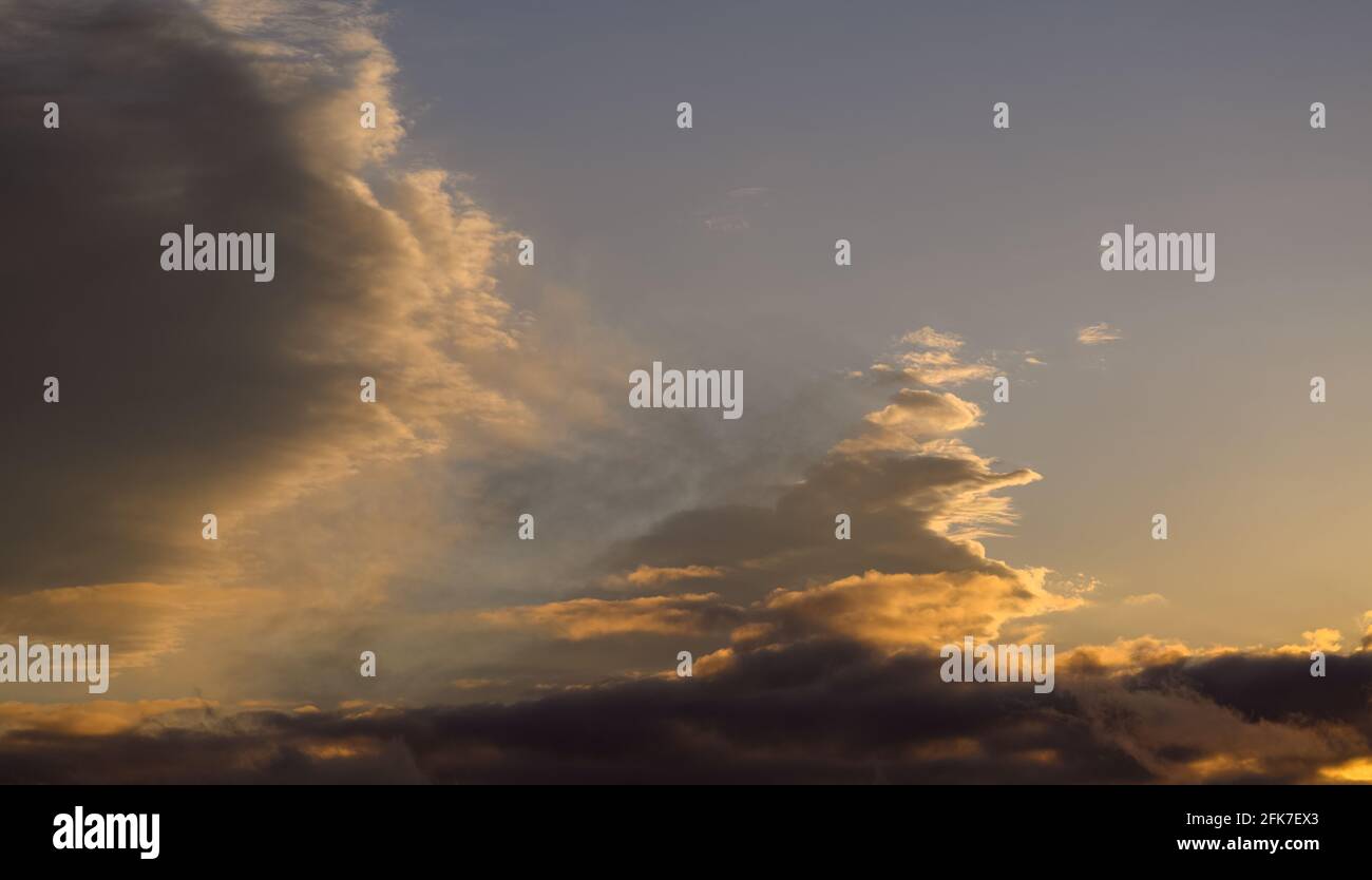 Beautiful colorful sunset sky with clouds and sunlight Stock Photo - Alamy