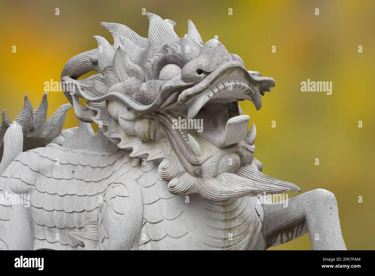 The mythical creature Kylin Oilins a symbol of power in China guarding the entrance to a building in Guilin China Stock Photo