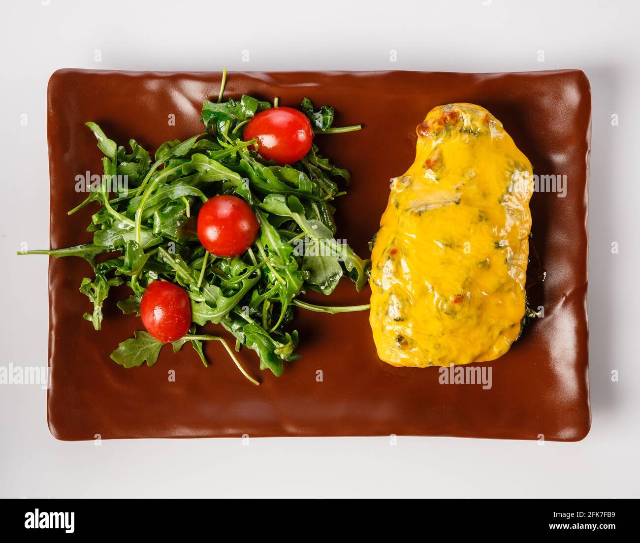Fillet with cheese and spinach. Stock Photo