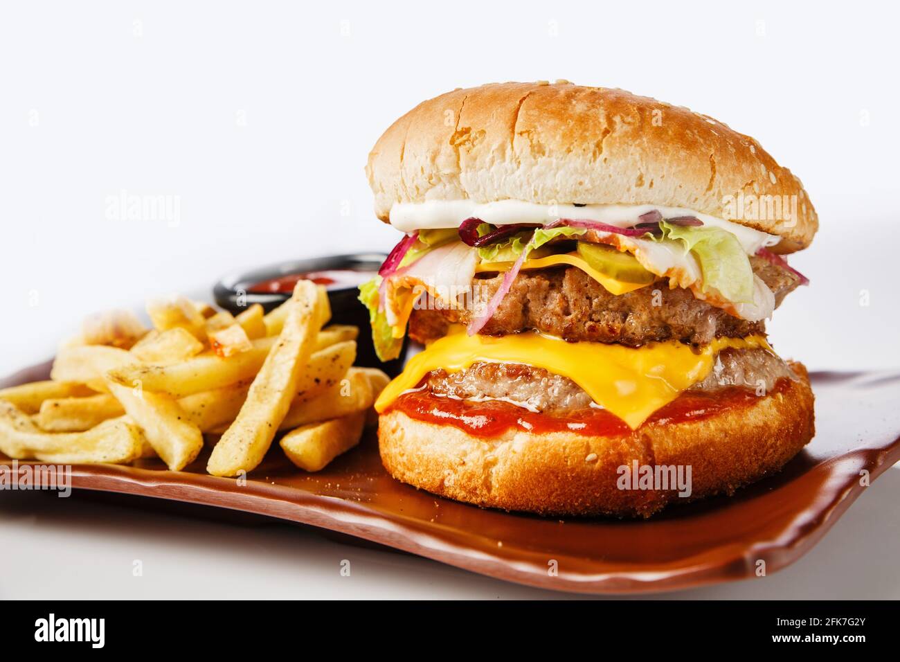 Burger. Juicy pork cutlet, cheddar cheese, crispy pickled onions