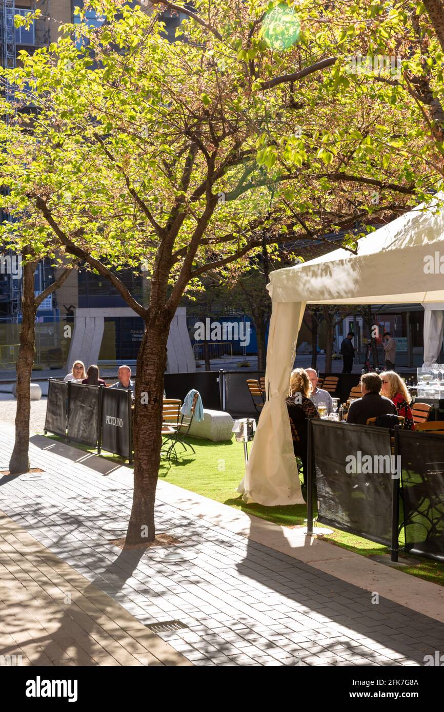 Outdoor eating area and space in Oozells Square, Birmingham city centre, UK Stock Photo