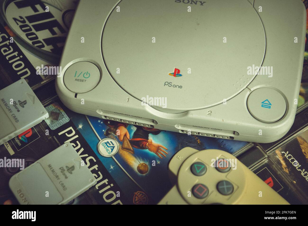 sales plan taxi Minimize Sony Playstation One Slim with memory cards and games in background Stock  Photo - Alamy