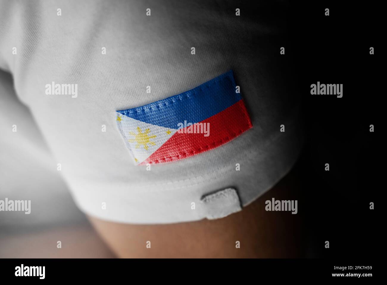 Patch of the national flag of the Philippines on a white t-shirt Stock Photo