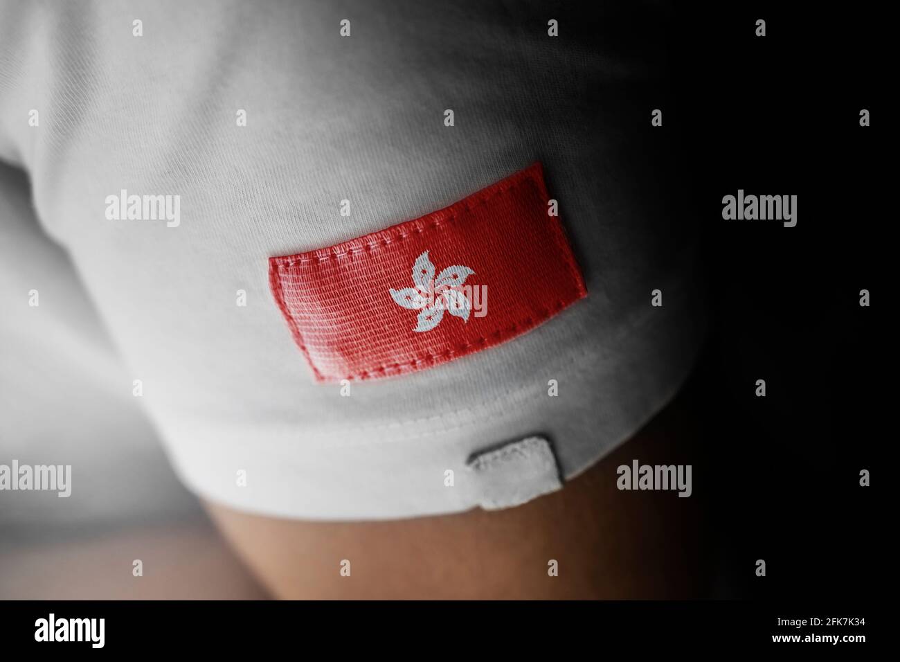 Patch of the national flag of the Hong Kong on a white t-shirt Stock Photo