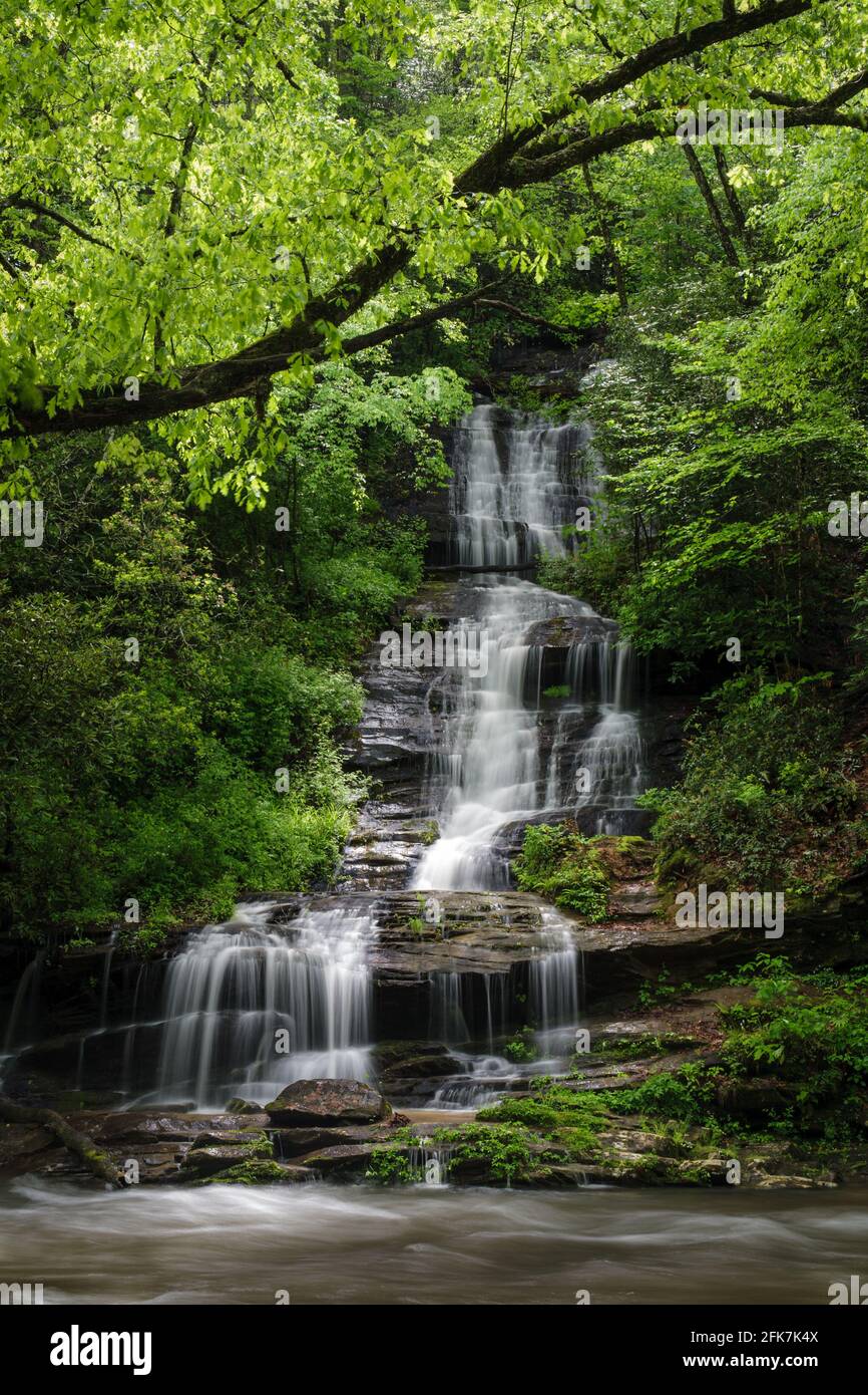 Tom Branch Falls- Swain County, North Carolina. A late morning break in the clouds highlights Tom Branch Falls along Deep Creek. Tom Branch Falls are Stock Photo