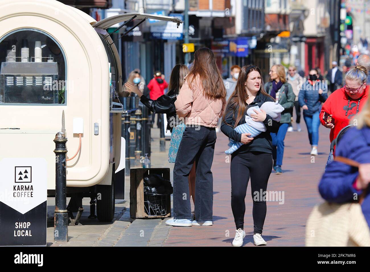 Canterbury, Kent, UK. 29 April, 2021. The Kent town of Canterbury is slowly regaining some resemblance of normalcy with lots of people walking around the high street enjoying the pleasant weather. Photo Credit: Paul Lawrenson /Alamy Live News Stock Photo