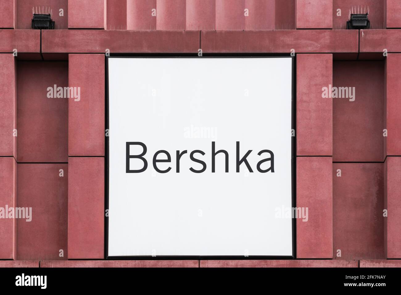 Berlin, Germany - July 12, 2020: Bershka logo on a wall. Bershka is a clothing retailer company. It is part of the Spanish Inditex group Stock Photo