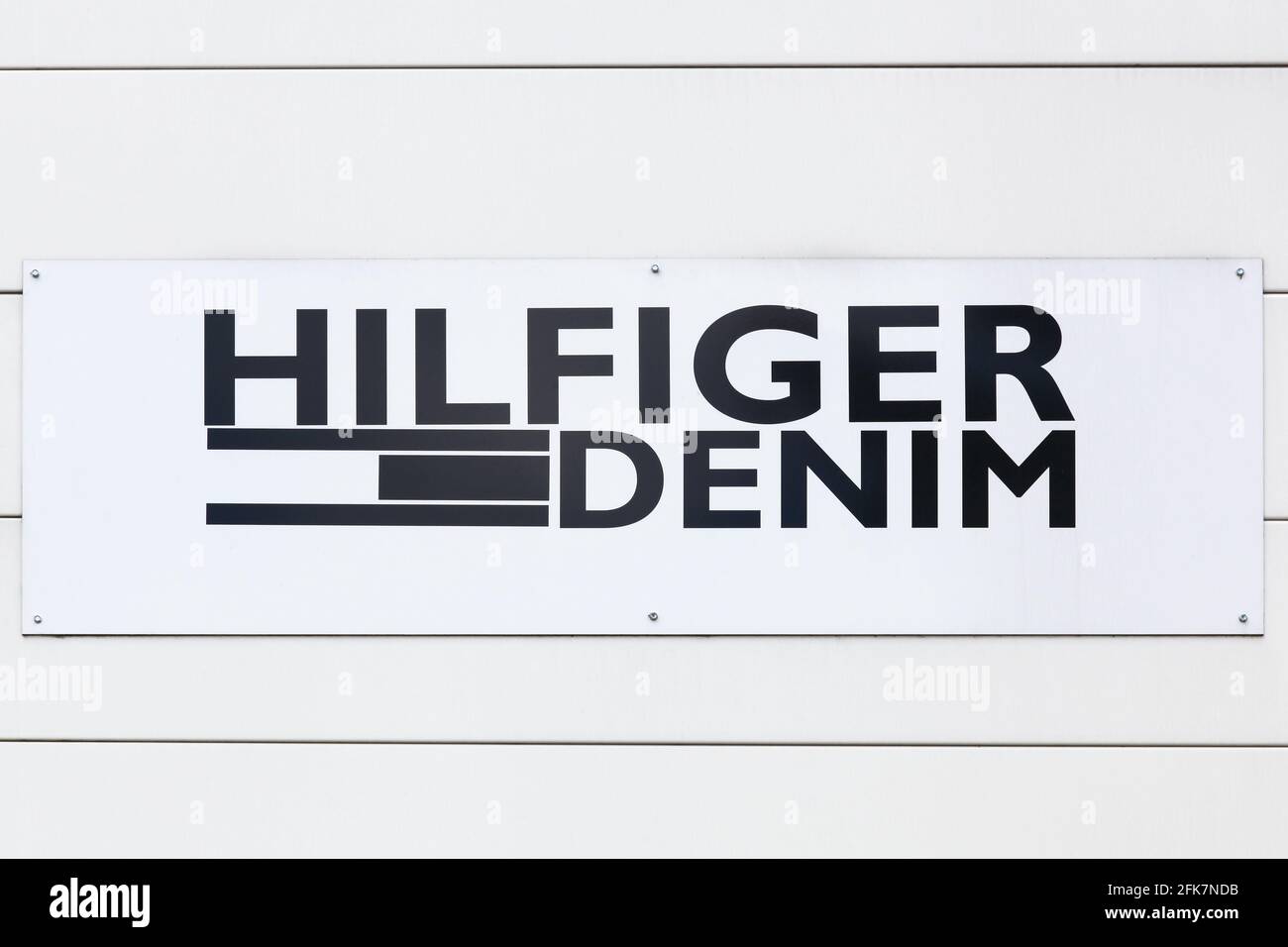 Saint Egreve, France - June 16, 2019: Tommy Hilfiger Denim logo on a wall  Stock Photo - Alamy