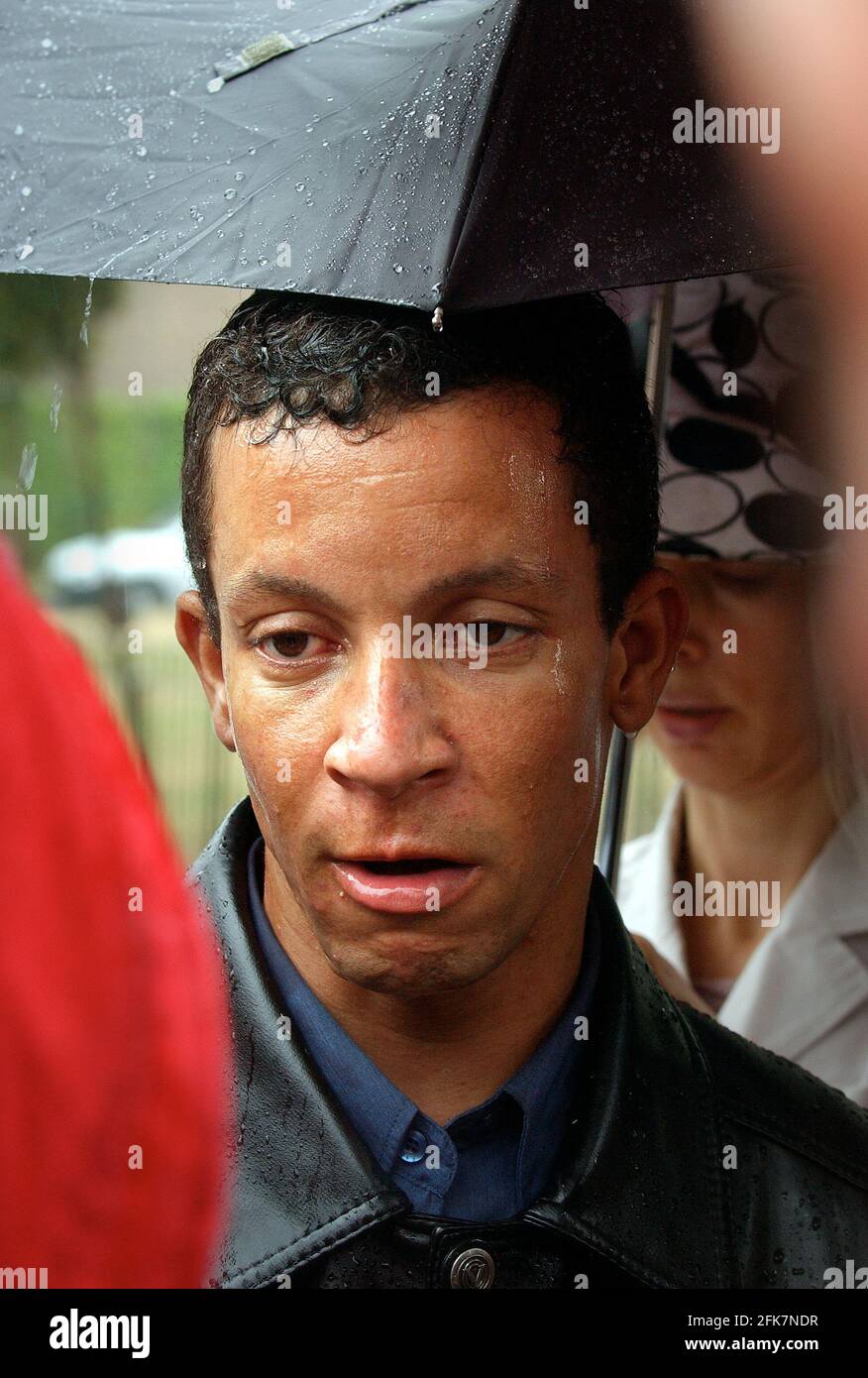 ALEX PEREIRA , COUSIN OF THE MAN SHOT BY THE POLICE AT STOCKWELL UNDERGROUND STATION,SPEAKING TO THE PRESS OUTSIDE THE DEAD MANS HOUSE IN TULSE HILL.24/7/05 TOM PILSTON Stock Photo