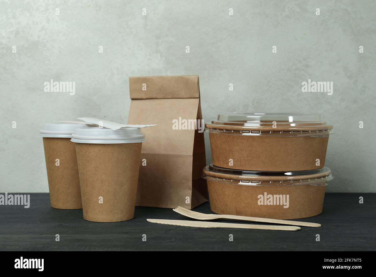 Sweet potato fries in a takeaway card container box with a wood fork.  Disposable recycling sustainable plastic free takeaway packaging Stock  Photo - Alamy