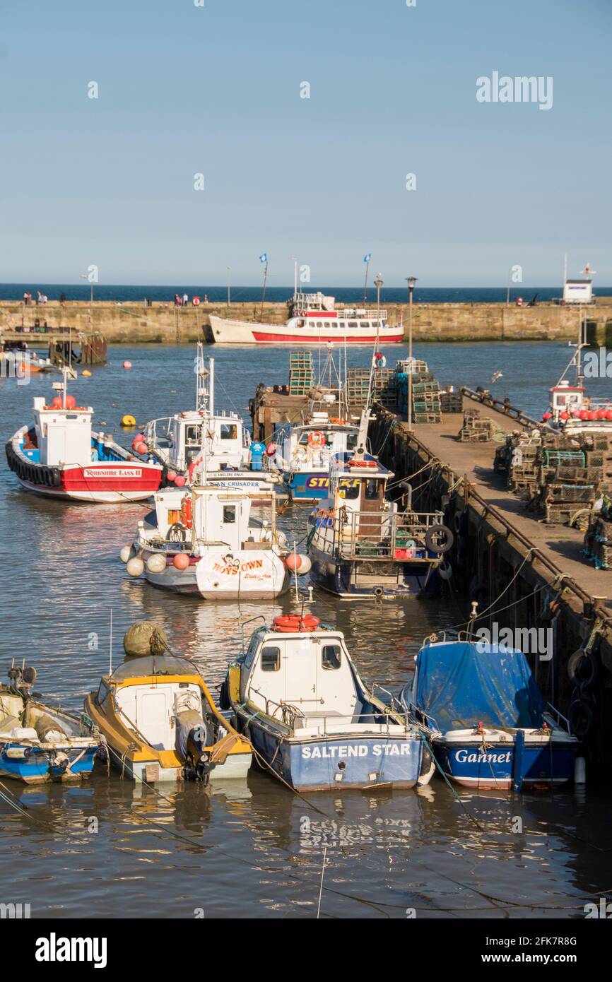 Yorkshire, UK – 10 Aug 2017 : over looking the boats in port at Bridlington Harbour Stock Photo
