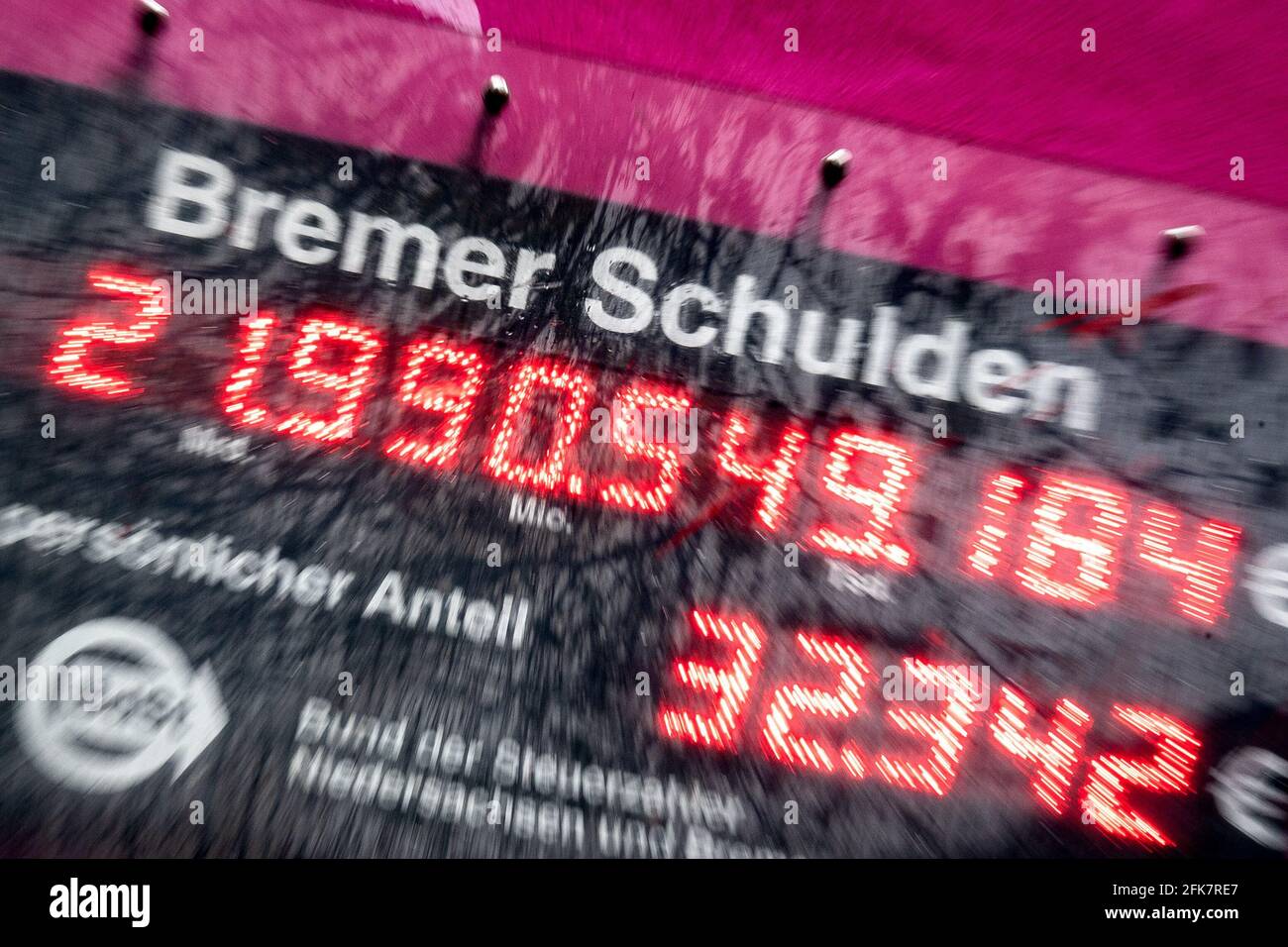 Bremen, Germany. 29th Apr, 2021. The Bremen debt clock shows the debt level (recording with zoom effect). The BdSt debt clock was programmed for the year 2021. Credit: Sina Schuldt/dpa/Alamy Live News Stock Photo