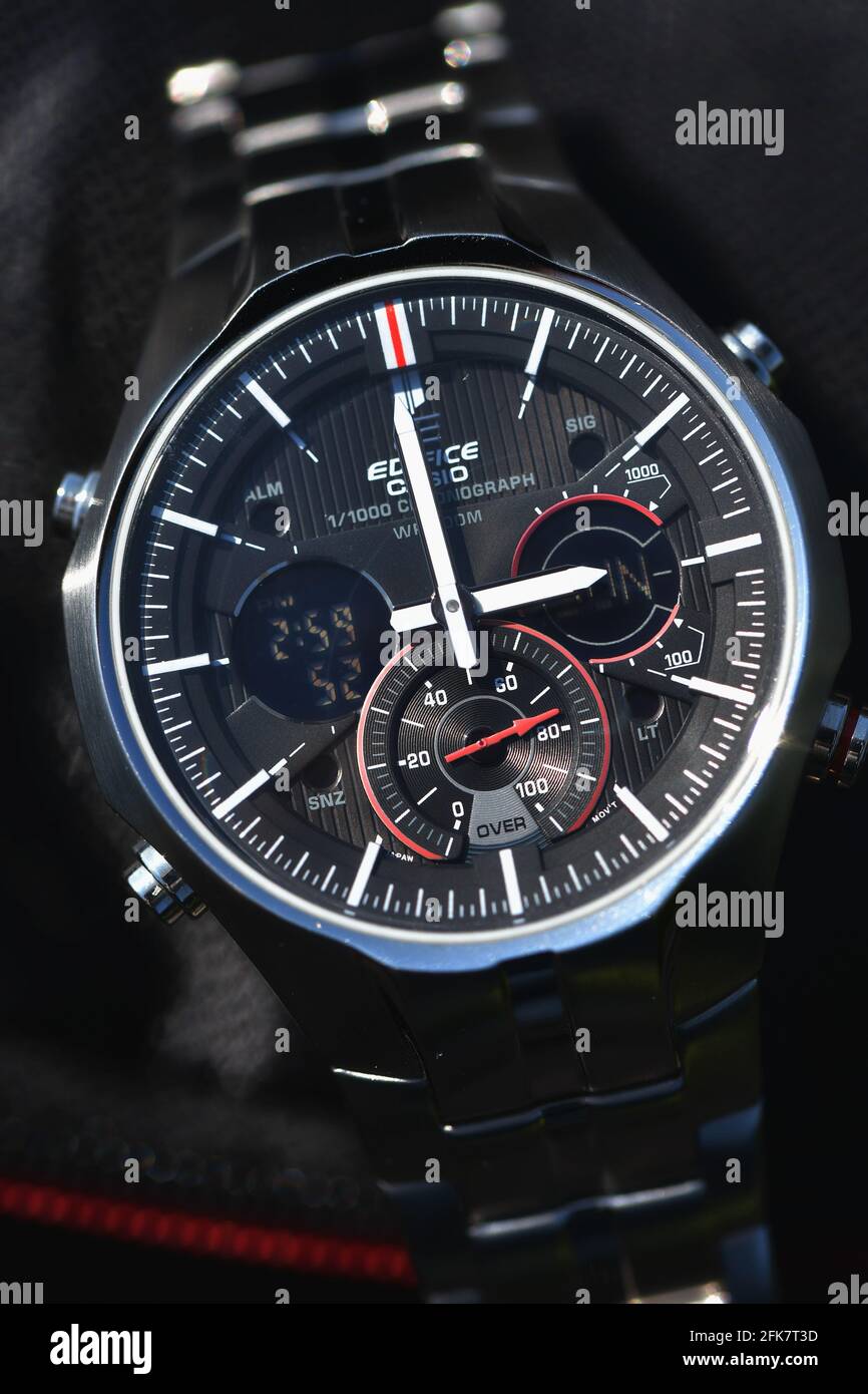 Casio Edifice Chronograph wrist watch shot with macro on a black background  with red accents Stock Photo - Alamy