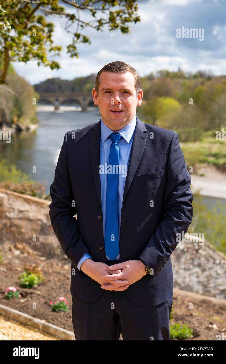 Coldstream, Scotland, UK. 29 April 2021. Douglas Ross, leader of the Scottish Conservative party makes speech in Coldstream in the Scottish Borders calling on pro-UK voters to use their peach party list votes to save Scotland’s recovery and stop another referendum.  Pic; Douglas Ross meets supports and the media at Henderson Park in Coldstream which stands on the Scottish-English border.  Iain Masterton/Alamy Live News Stock Photo
