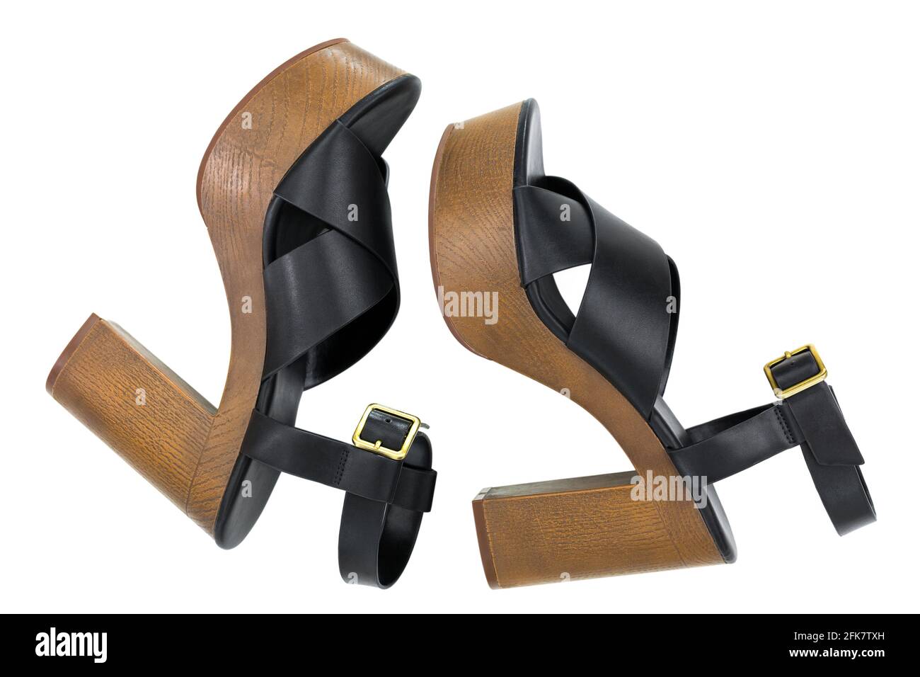 Side view of Black high-heel shoes with open toe cross strap platform sandals with brown chunky block heel, ankle strap fastens with metal buckle isol Stock Photo
