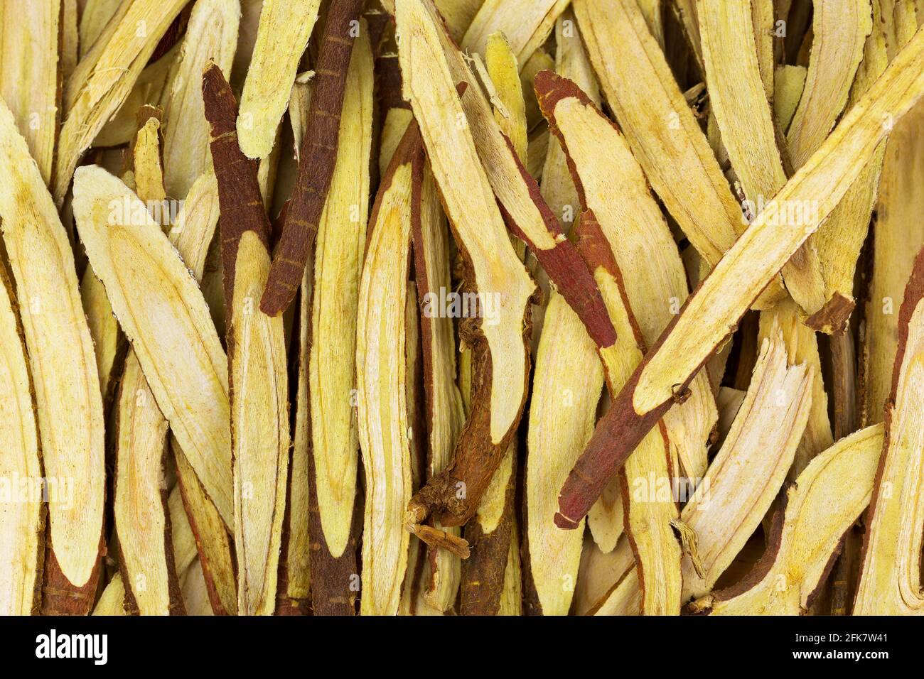 Closeup thinly sliced licorice root (Liquorice) used as herbal medicine (Glycyrrhiza glabra
