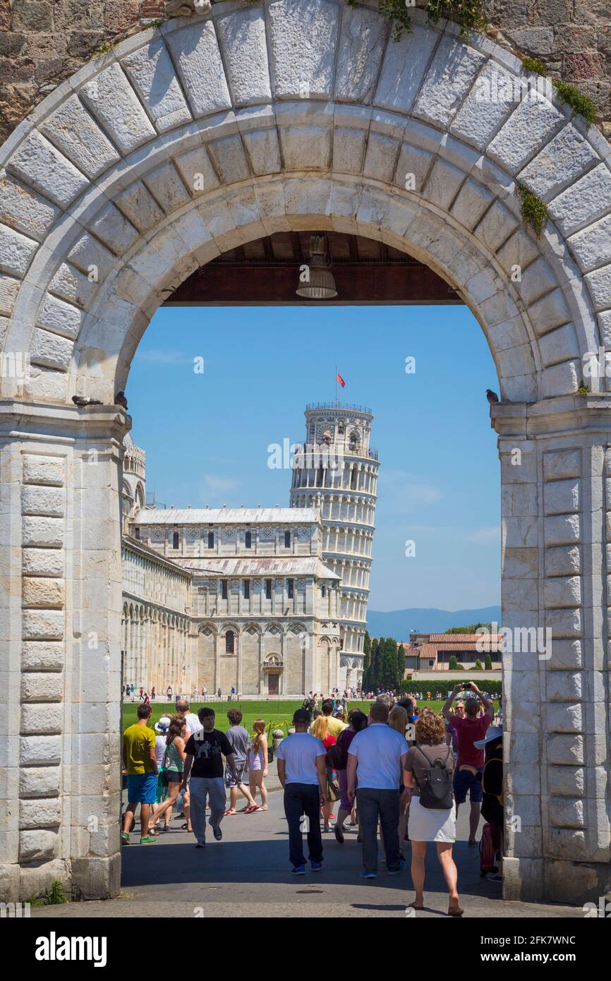 Pisa, Pisa Province, Tuscany, Italy.  Archway into the Campo dei Miracoli, or Field of Miracles.  Also known as the Piazza del Duomo.  The cathedral, Stock Photo