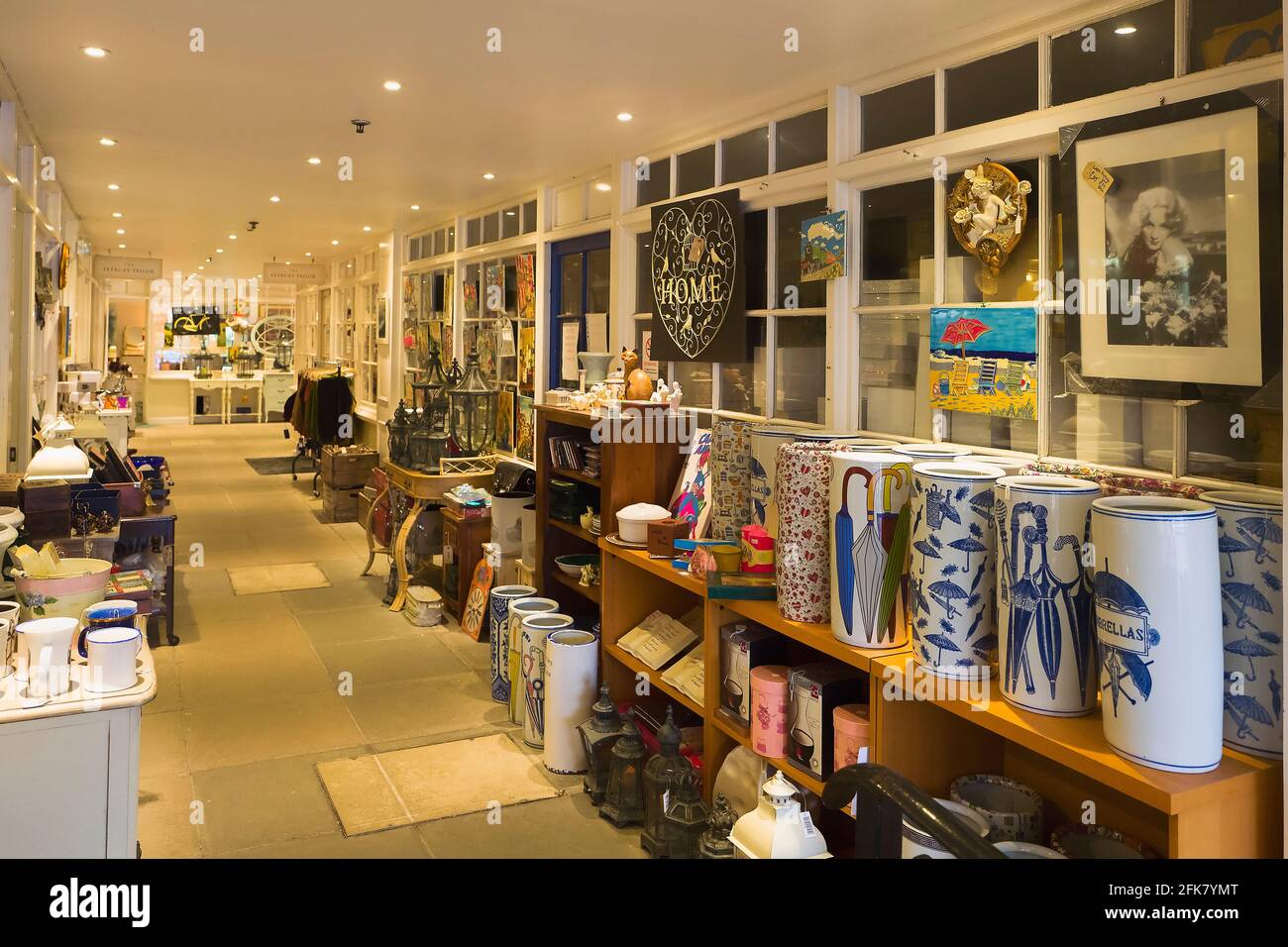 Interior of a shopping mall in Tetbury Gloucestershire UK showing new homeware products including umbrella stands Stock Photo