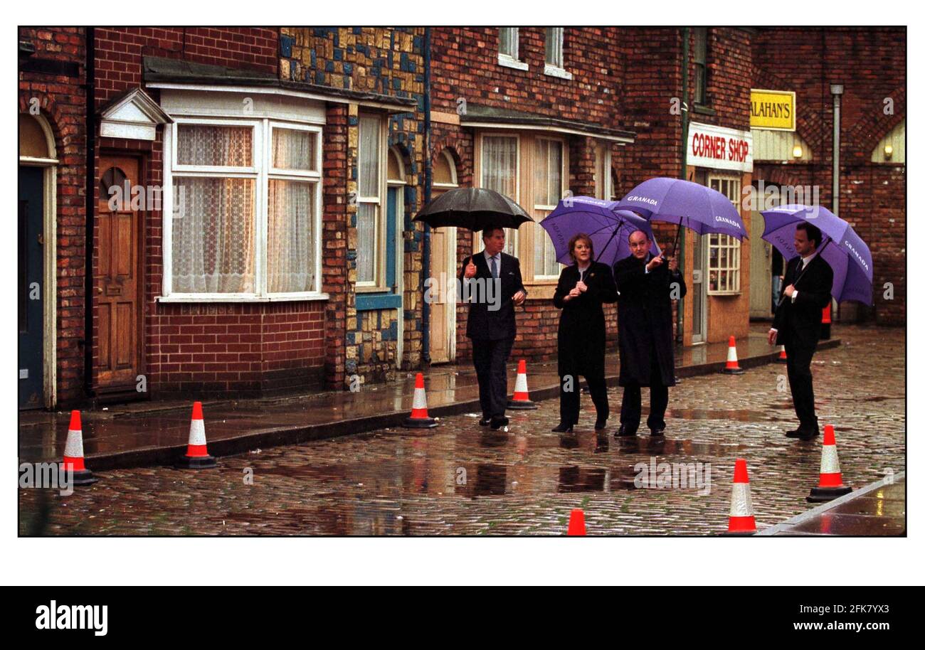 H.R.H. The Prince of Wales today visited the set of Coronation Street to mark the occasion of the programs 40th anniversary. H.R.H. took part in celebrations and met cast and crew as they prepare for tonights historic live episode. The cast were Ken Barlow (William Roache) Linda Baldwin(Jacquline Pirie) young David Platt(Jack P Shepherd) Geena Gregory(Jennifer James) Sarah Platt(Tina O'Brien) and Steve Mc Donald(Simon Gregson) Stock Photo