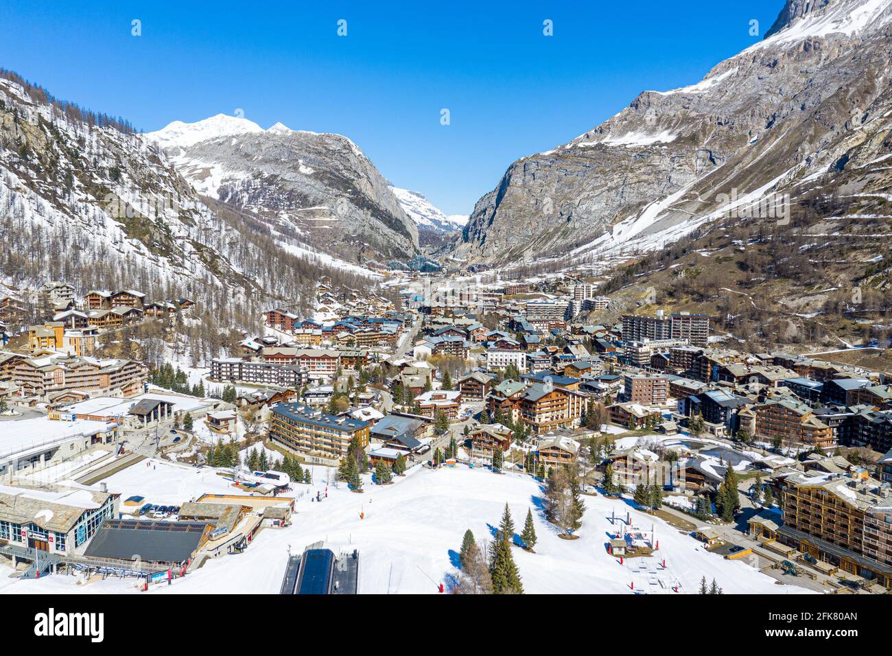 Wide and High Drone shot of val isere, a small ski resort town located ...