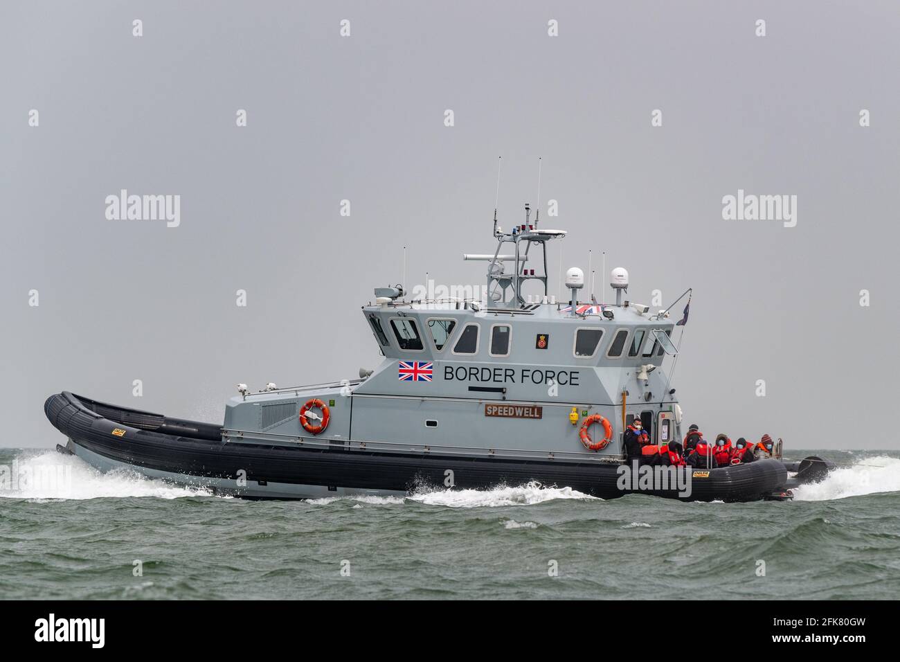 Migrants who have just crossed the English Channel from France on dinghies having been picked up by Border Force UK patrols. English Channel, Kent, UK Stock Photo