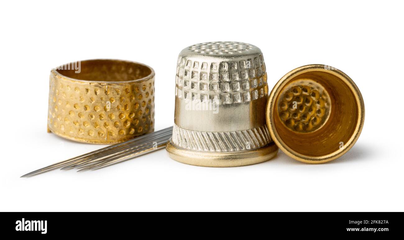Metal sewing thimble isolated on white Stock Photo - Alamy