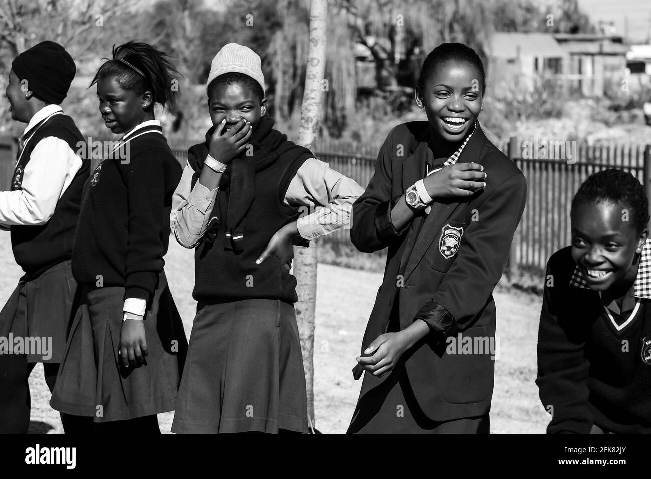 JOHANNESBURG, SOUTH AFRICA - Mar 13, 2021: Johannesburg, South Africa - June 19, 2014: Diverse African high school pupils messing about on the sports Stock Photo