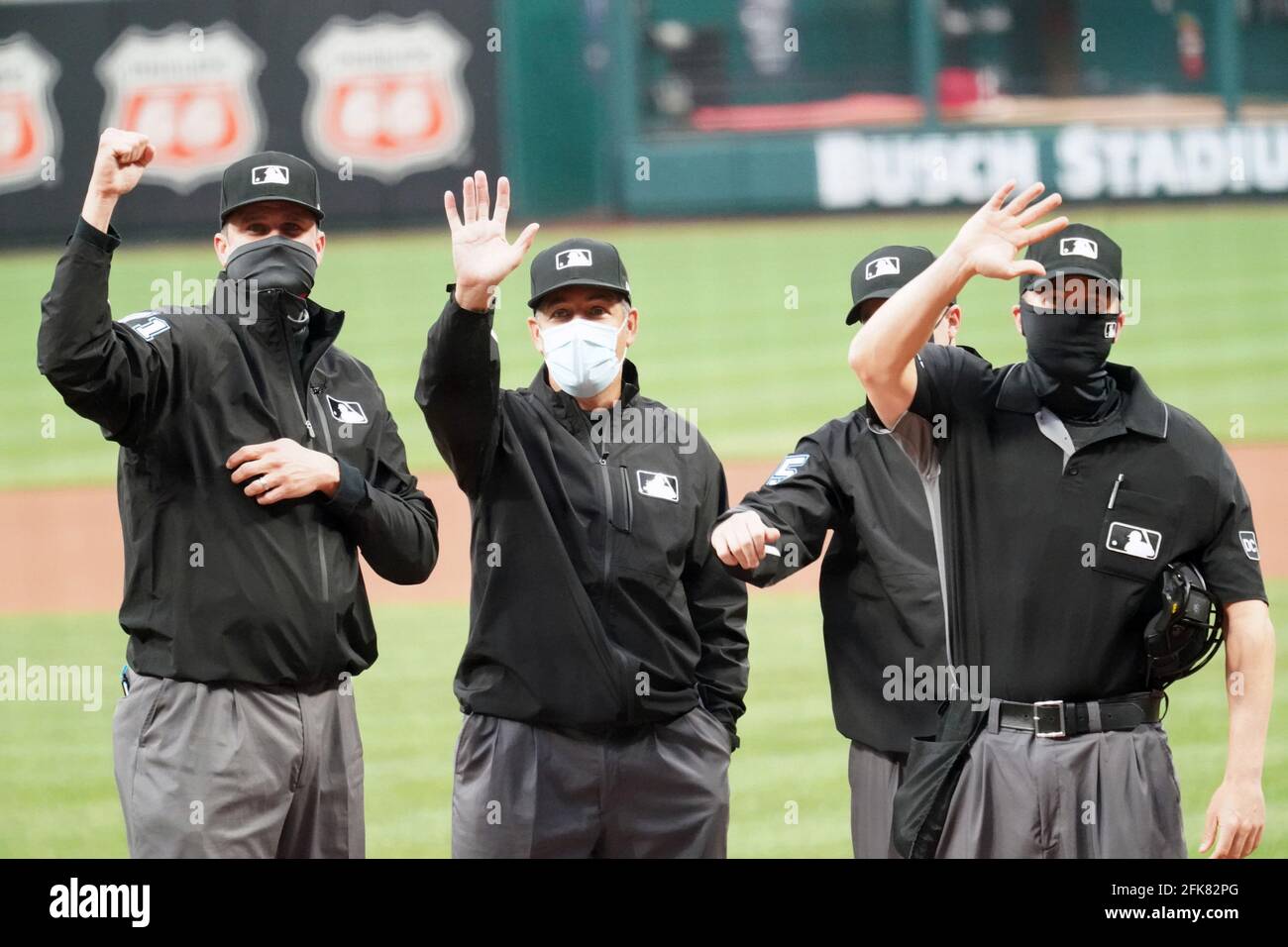 St. Louis, United States. 29th Apr, 2021. Major League Umpires (L-R) Jordan Baker, James Hoye, Brennan Miller and Chris Segal, wave to family members in the stands, before the Philadelphia Phillies-St. Louis Cardinals baseball game at Busch Stadium in St. Louis on Wednesday, April 28, 2021. Photo by Bill Greenblatt/UPI Credit: UPI/Alamy Live News Stock Photo