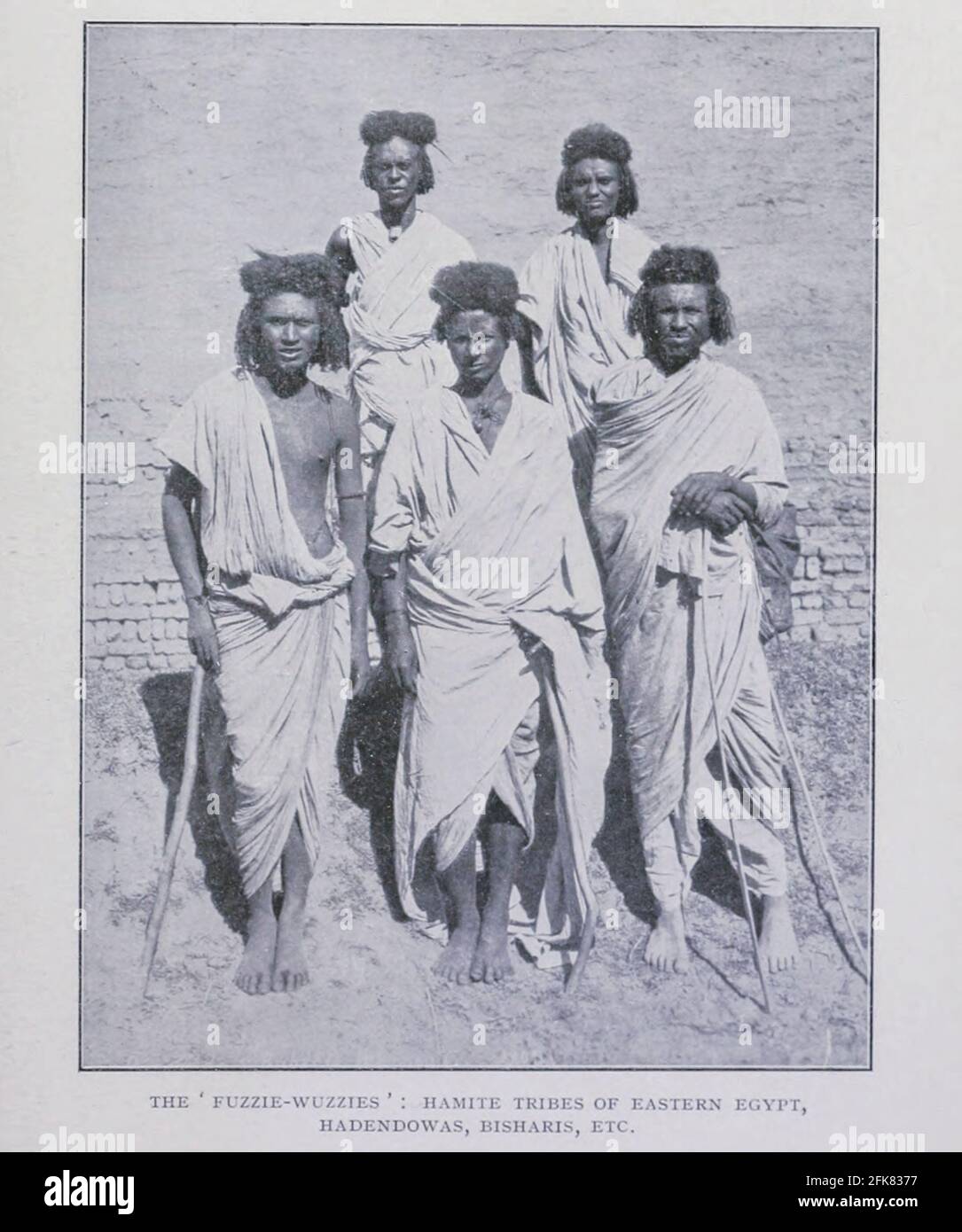 The ' fuzzie wuzzies ' hamite tribes of eastern Egypt Hadendowas, Bisharis, etc ['Fuzzy-Wuzzy' was the term used by British soldiers for Beja warriors who were supporting the Mahdi of Sudan in the Mahdist War. The term relates to the elaborate tiffa hair style favoured by the Hadendoa tribe, a subdivision of the Beja people. ] From the Book '  Britain across the seas : Africa : a history and description of the British Empire in Africa ' by Johnston, Harry Hamilton, Sir, 1858-1927 Published in 1910 in London by National Society's Depository Stock Photo