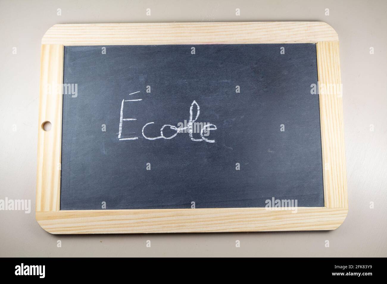 Chalkboard slate with school written in french language Stock Photo Alamy