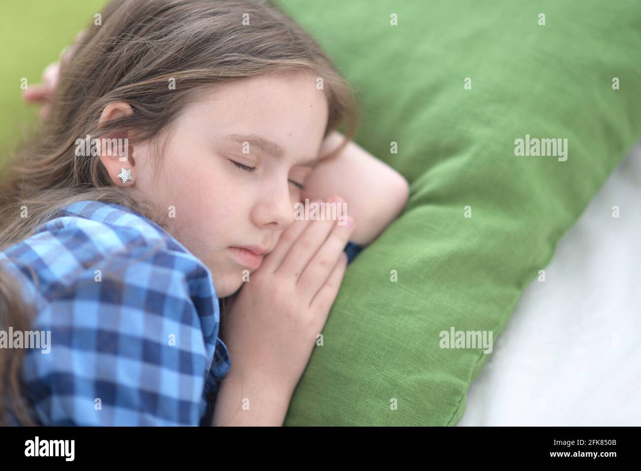 Cute little girl sleeping in bed at home Stock Photo Alamy