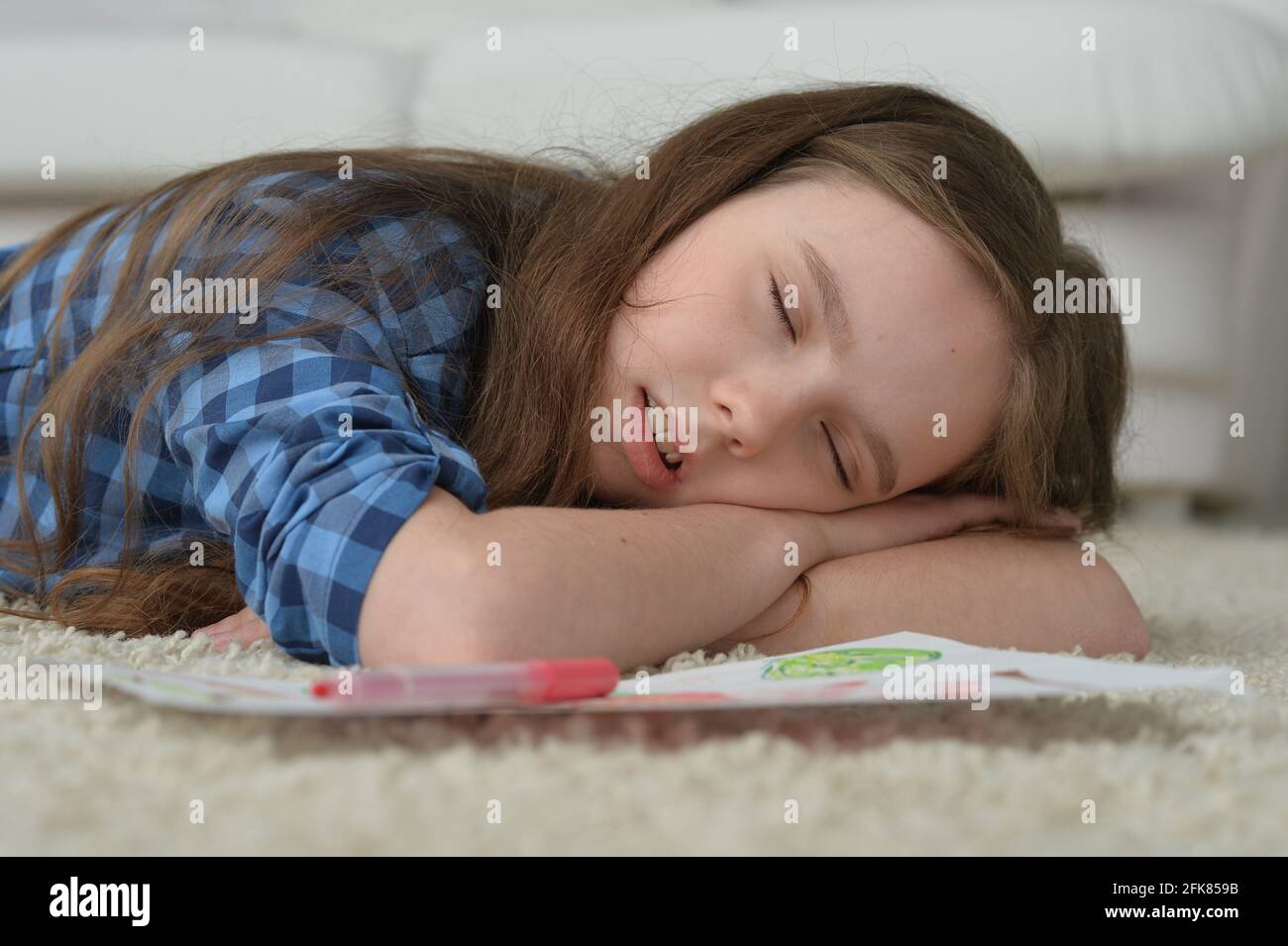 Beautiful girl sleeping on the floor at home Stock Photo Alamy