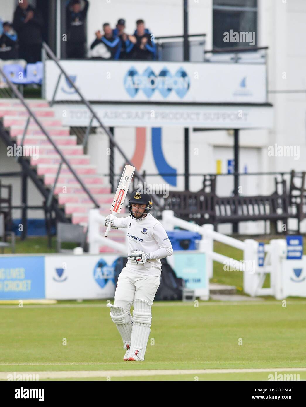 Cricket batsman raising bat hi-res stock photography and images - Alamy