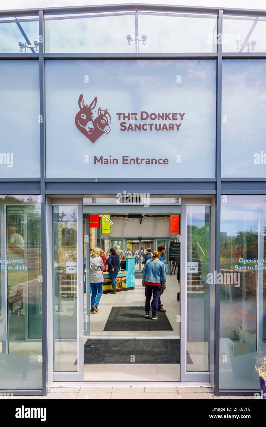 Main entrance to The Donkey Sanctuary for retired donkeys, Sidmouth, Devon in south coast West Country, England, a popular family tourist attraction Stock Photo