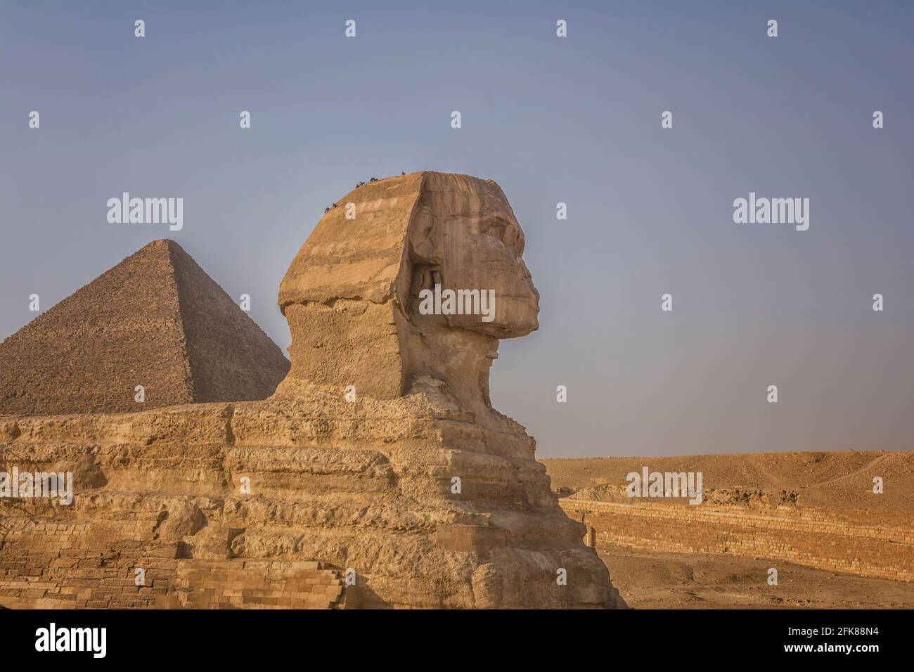 The Sphinx in front of the Pyramids, close view Stock Photo - Alamy