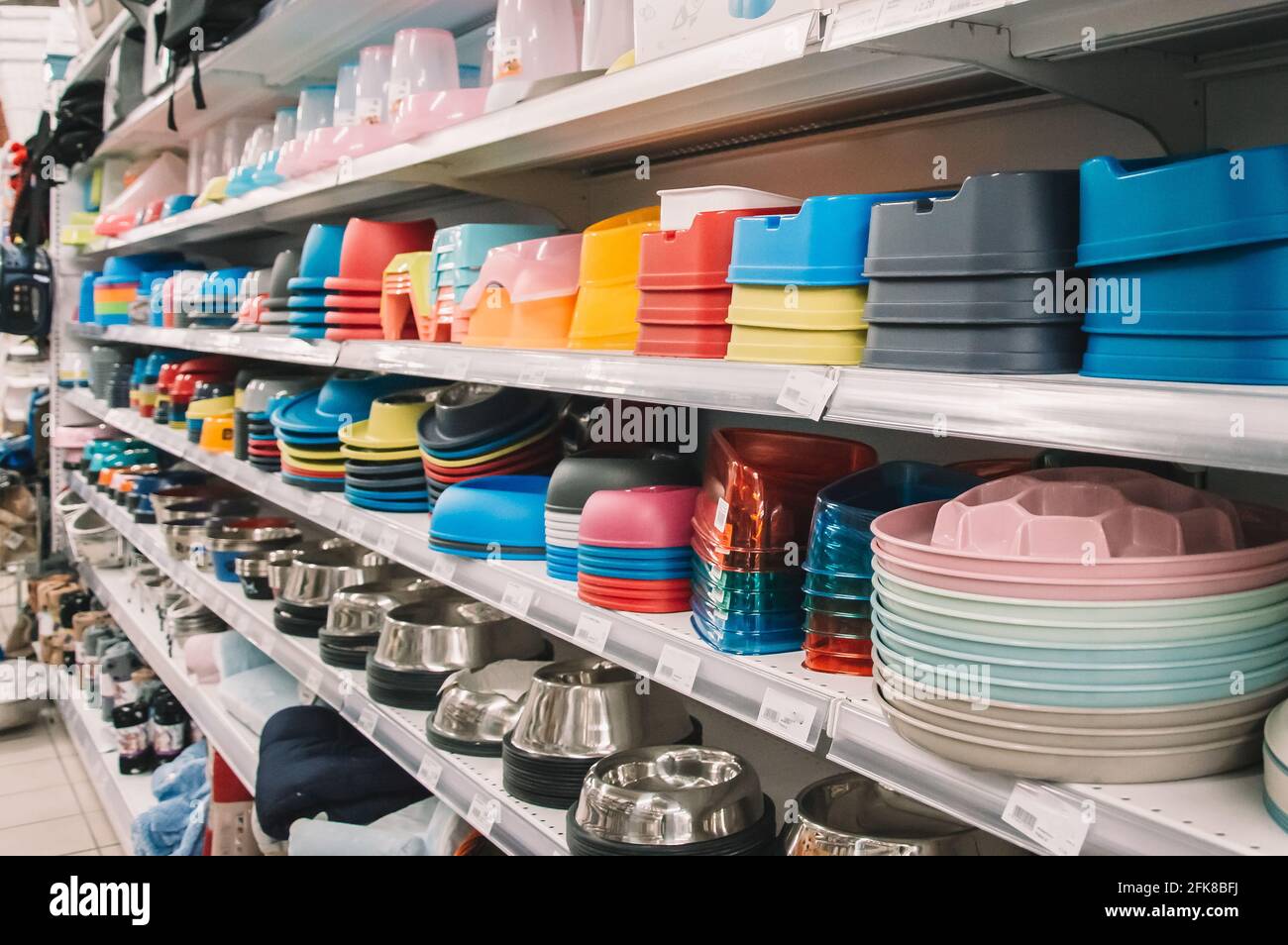 Interior of store with large assortment of pet accessories,bowls for pets Photo - Alamy