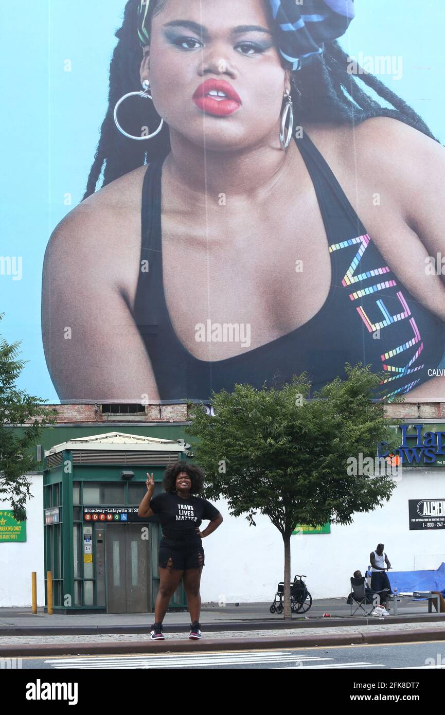 New York - NY - 07/04/2020 - Jari Jones (black transgender modelactress and  activist) stopping to take pictures in front of her large Calvin Klein  billboard in Soho. The ad is part