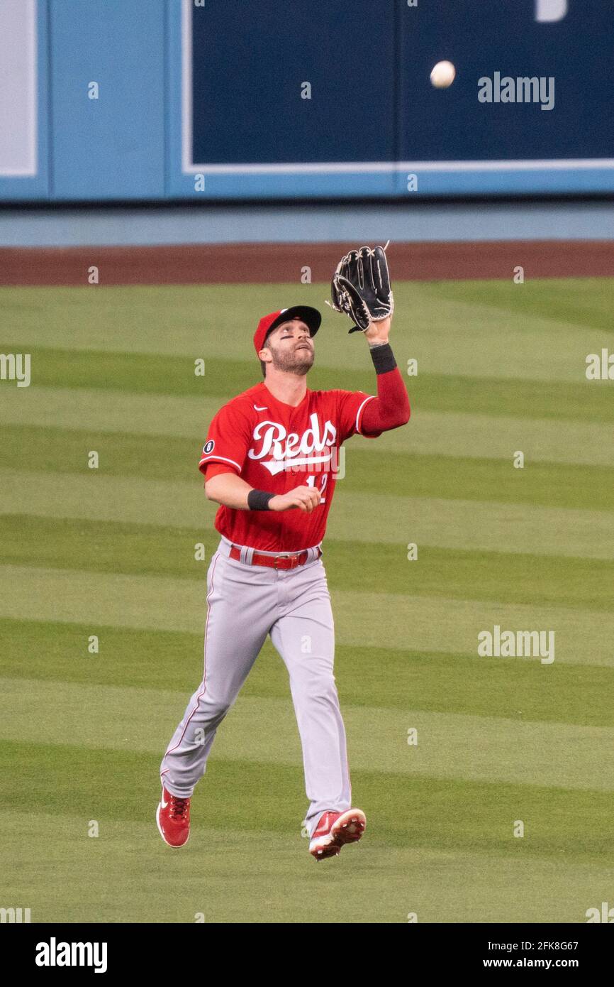 Los Angeles, United States. 28th Apr, 2021. Cincinnati Reds right fielder Tyler  Naquin (12) catches a pop up during a MLB game against the Los Angeles  Dodgers, Tuesday, April 27, 2021, in